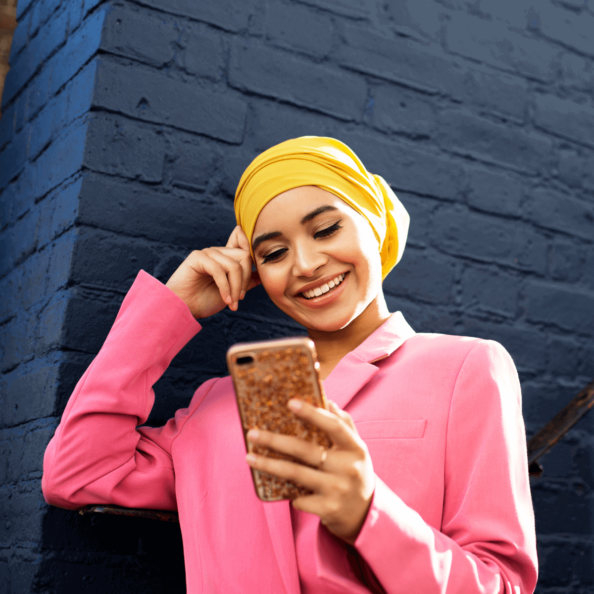 Woman in pink coat on mobile phone