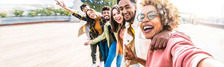 Group of multiracial friends take a selfie