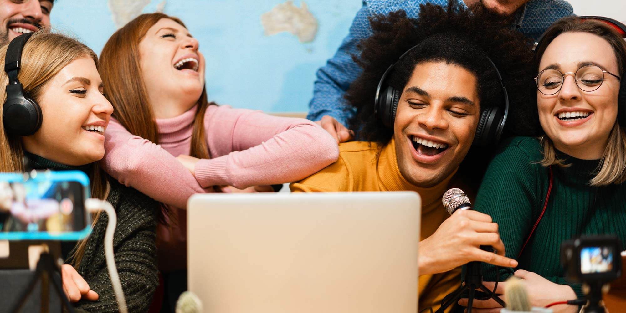 multicultural group of young people have fun while live streaming a podcast