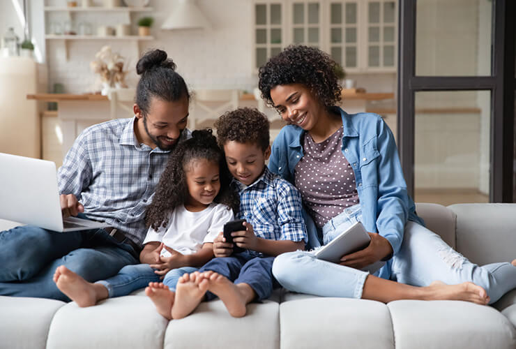 family looking at phone