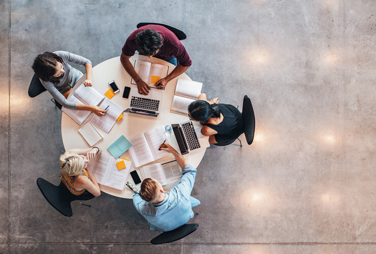 top view of group around table on public wifi